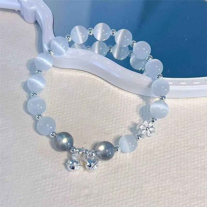 Buddha Stones Cat’s Eye Crystal Peach Blossom Bell Fu Character Charm Support Bracelet